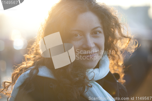 Image of Beautiful girl in evening sunlight