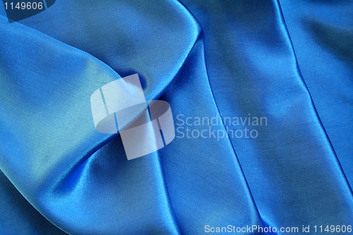 Image of Smooth elegant blue silk as background 