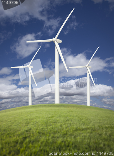 Image of Wind Turbines Over Grass Field, Dramatic Sky and Clouds