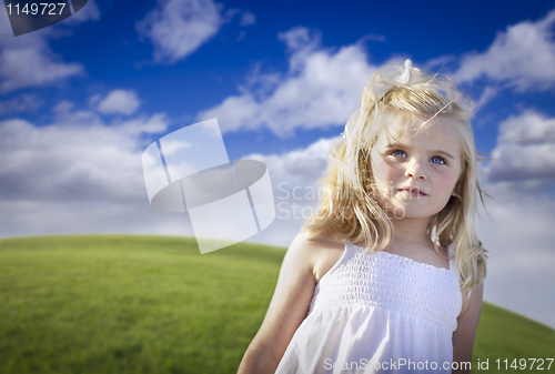 Image of Adorable Blue Eyed Girl Playing Outside
