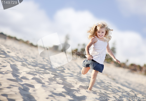 Image of Adorable Little Girl Having Fun at the Beach