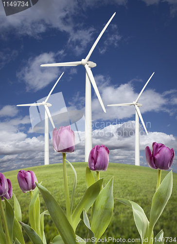 Image of Wind Turbines Against Dramatic Sky, Clouds and Violets