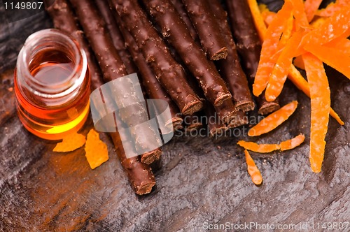 Image of chocolate sticks with orange