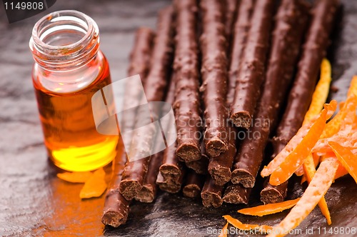 Image of chocolate sticks with orange