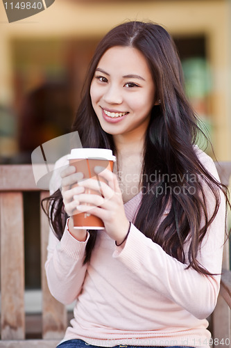 Image of Woman drinking coffee
