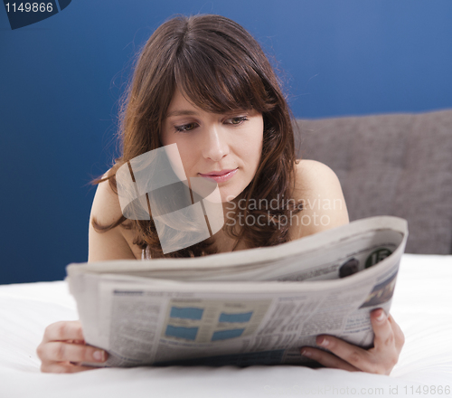 Image of Reading the newspaper