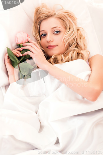 Image of girl in the bed