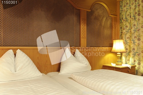 Image of Double bed in hotel room