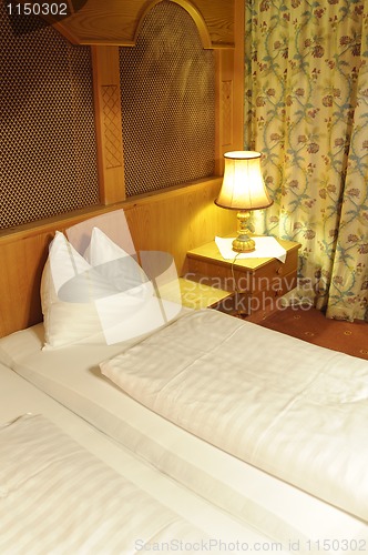 Image of Double bed in hotel room