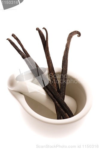 Image of mortar with vanilla pods 