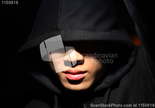 Image of Monochrome picture of a guy in a hood 