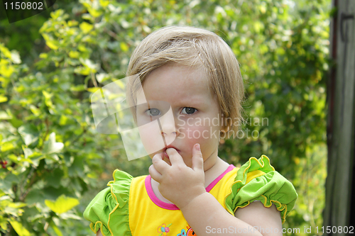 Image of Little girl in the garden