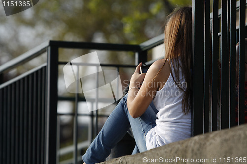 Image of Female with Mobile