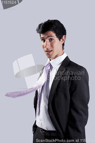 Image of Businessman with a flying necktie