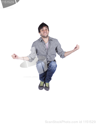 Image of young man jumping