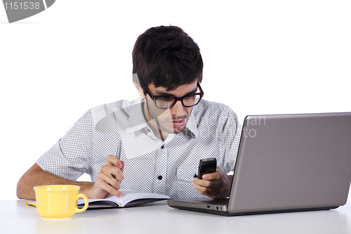 Image of Young modern busy businessman