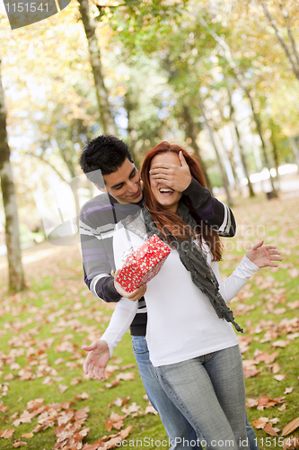 Image of young couple surprise