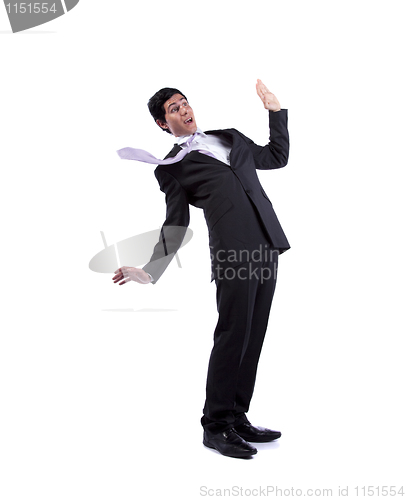 Image of Businessman almost falling