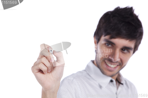 Image of businessman writing at a whiteboard