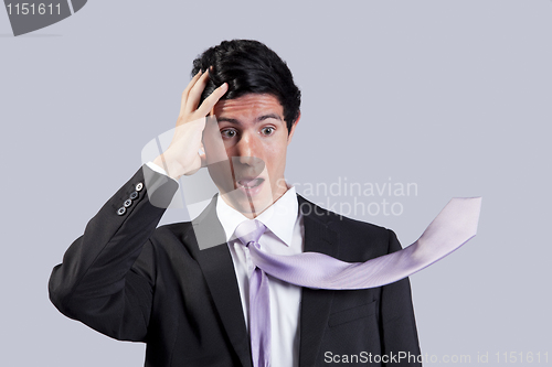 Image of Businessman with a flying necktie