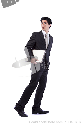 Image of Businessman walking and looking back