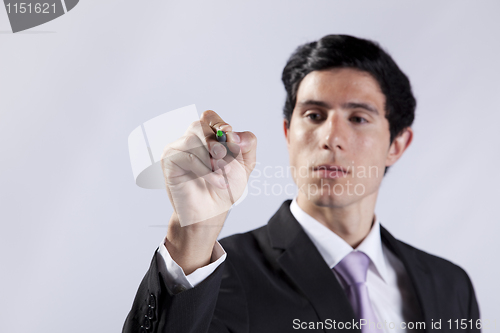 Image of Businessman writing on the whiteboard