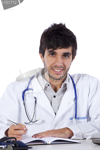 Image of frendly young doctor at his office