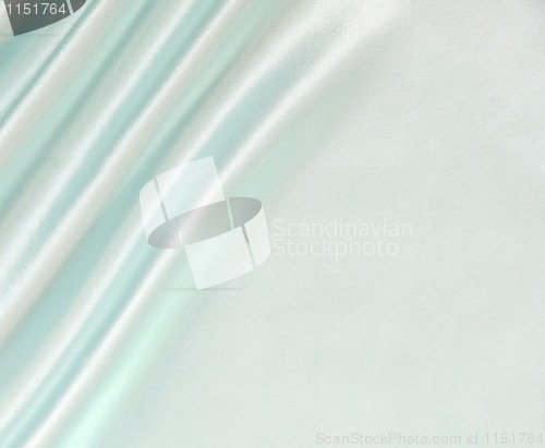 Image of Smooth elegant blue silk as background 