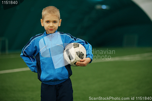 Image of boy and a football
