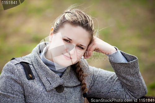 Image of The girl longs on the nature