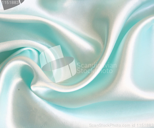 Image of Smooth elegant blue silk as background 