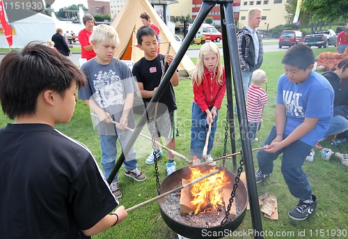 Image of Children barbecue.
