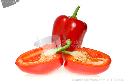 Image of Whole red sweet pepper and two halves