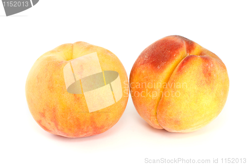 Image of Pair of orange peaches