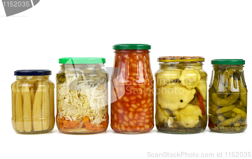 Image of Five glass jars with marinated vegetables