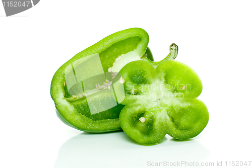 Image of Half of green sweet pepper and flower-shaped slice