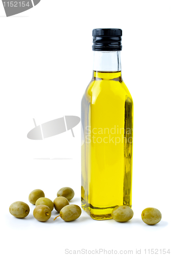 Image of Bottle of olive oil and some olives