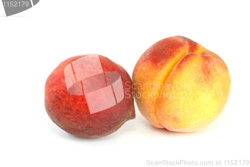 Image of Orange and red peaches