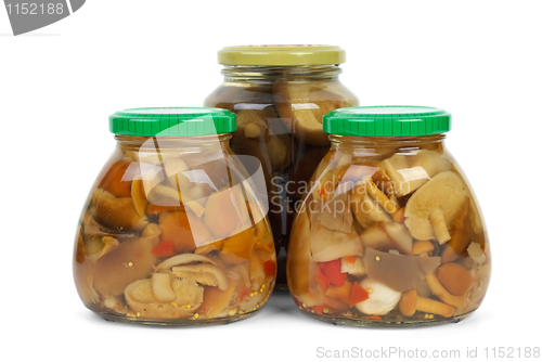 Image of Glass jars with marinated mushrooms