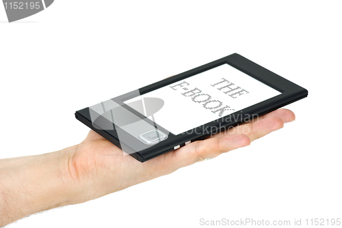 Image of E-book reader lie on palm