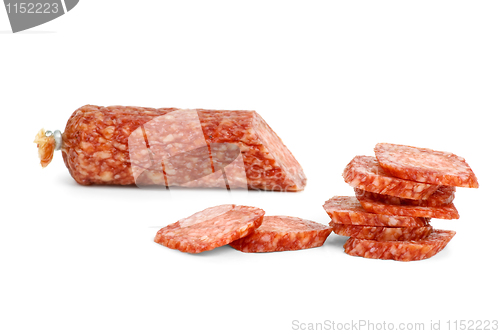 Image of Half of salami sausage and slices near