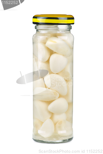 Image of Glass jar with marinated garlic cloves