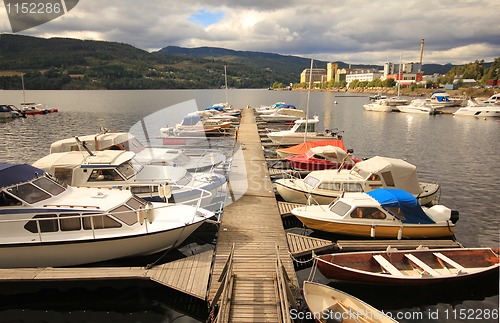 Image of Small boats by the marina.