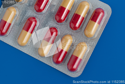 Image of Red and yellow pills