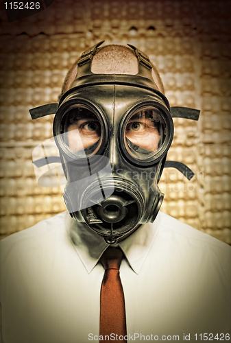 Image of businessman with gas mask