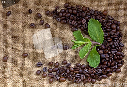 Image of Heap of burnt brown arabica coffee beans 