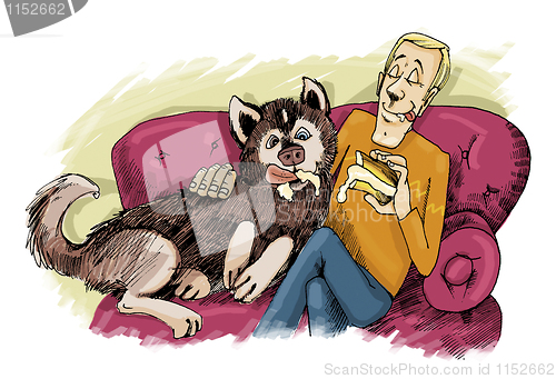 Image of husky dog and his owner on sofa