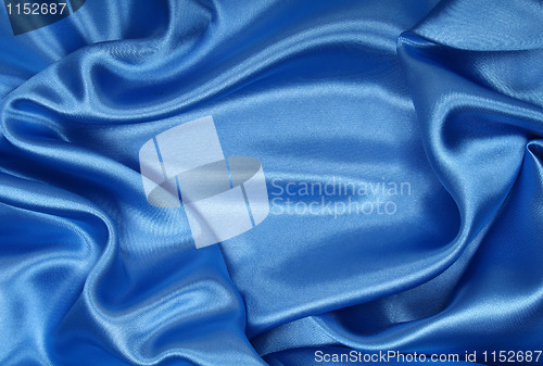 Image of Smooth elegant blue silk as background 