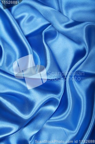 Image of Smooth elegant blue silk can use as background 