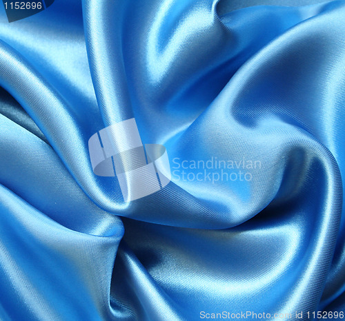 Image of Smooth elegant dark blue silk as background 